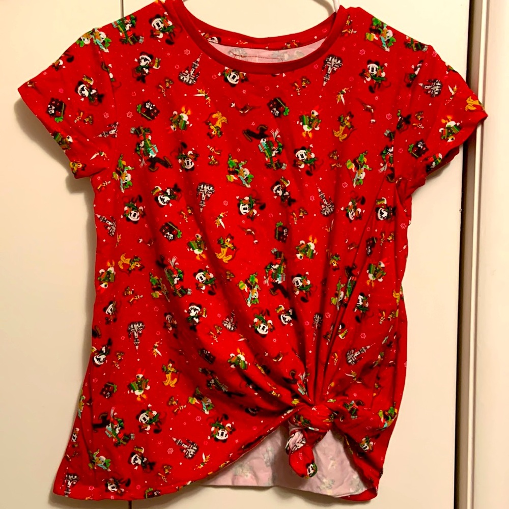This Disney Christmas shirt it's stretchy but in a thicker material.